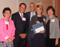 Prairie State College student Peggy Michel (fourth from left)
accepts her $500 scholarship from Illinois Senate Majority Leader Debbie Halvorson, Illinois Community College System Foundation board member Richard Wilson, PSC president Paul McCarthy, and PSC trustee Peg Donahue.