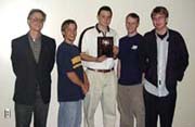 Coach Bill Yarrow (left) has Joliet Junior College to three straight College Bowl wins.